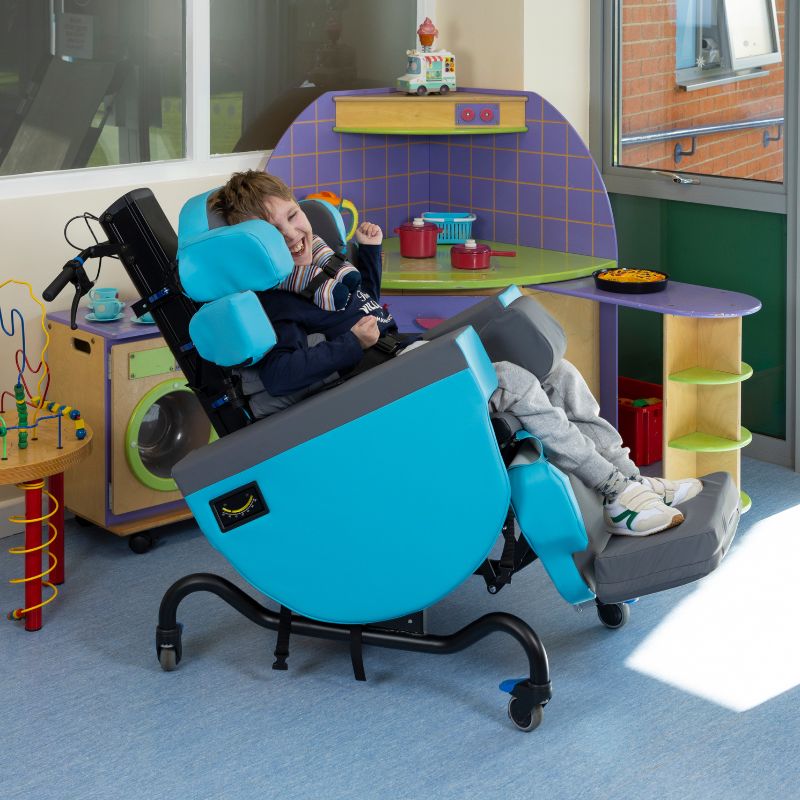 Child laughing in blue SmartSeat Pro II