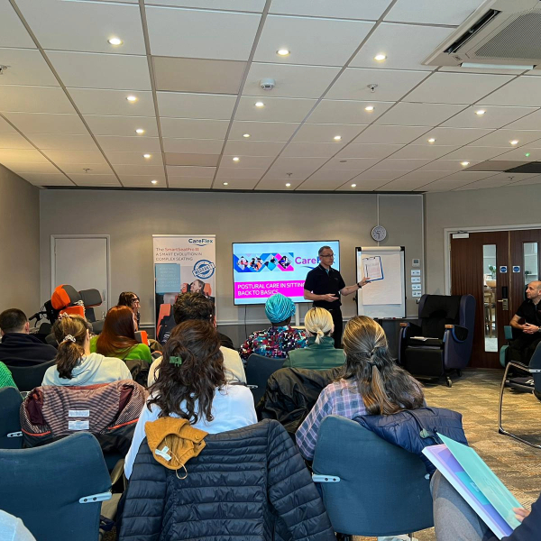 specialist seating assessor conducting a training session